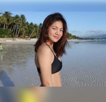 Kyla by the beach