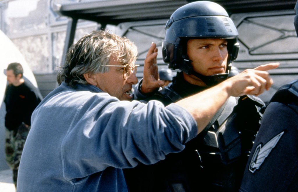 Paul Verhoeven behind the scene of Starship trooper. Photo Credit: Tristar Pictures (rollingstone.com)