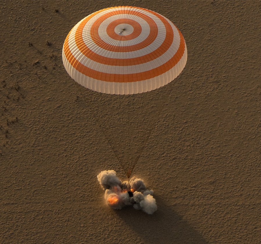 Soyuz firing its landing rockets. Photo Credit: NASA