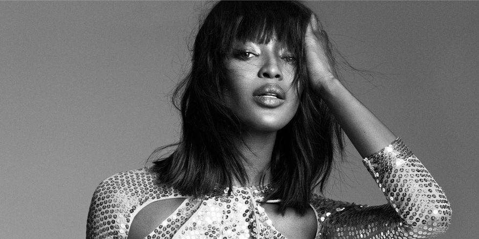 Supermodel Naomi Campbell poses for Vogue.