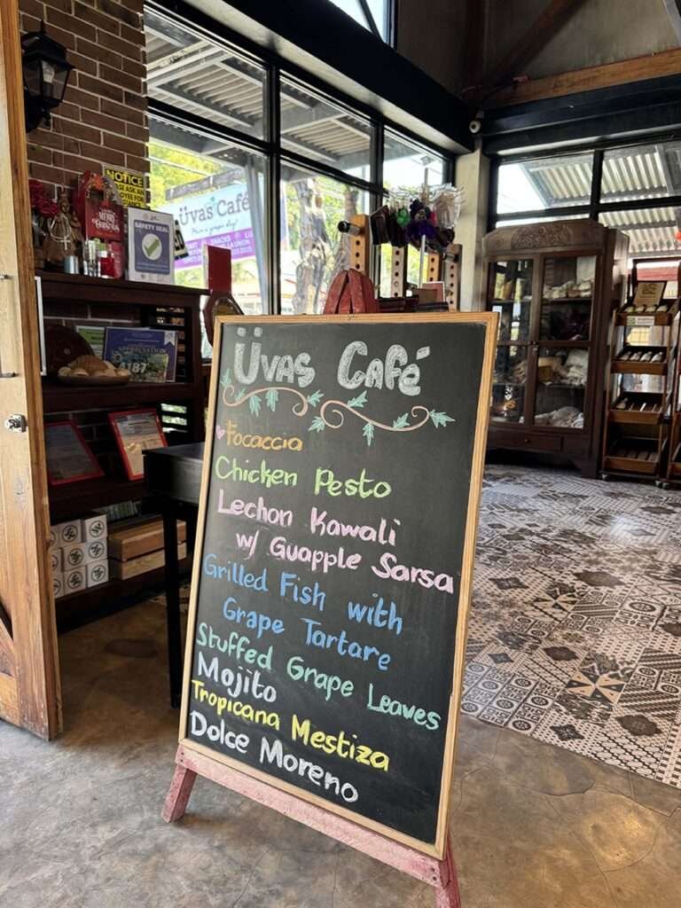 Uvas Cafe in La Union with their menu signboard featuring their enticing dishes and drinks.