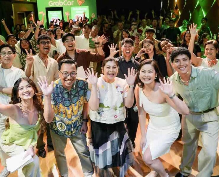 Grab Philippines Country Head Ronald Roda and Department of Tourism Assistant Secretary Sherlene Batin lead the launch of the #GrabIbaAngSummer Campaign, spotlighting under-the-radar adventure and culinary spots across the Philippines