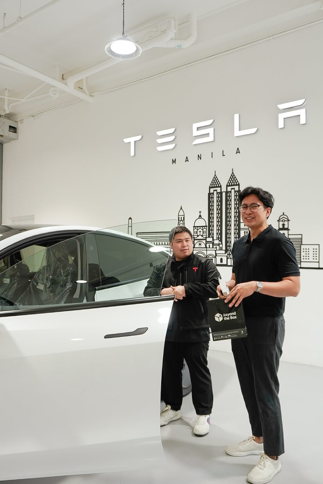 Beyond the Box and Digital Walker officially turned over a Tesla Model Y to Joshua Juanillo, the lucky winner of the iPhone 17 launch raffle. 